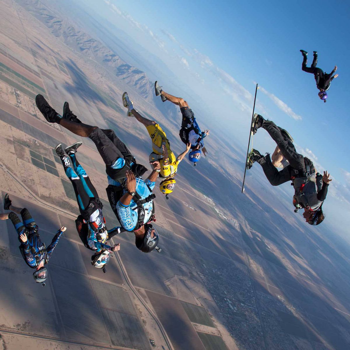Group of experienced skydivers in free fall.